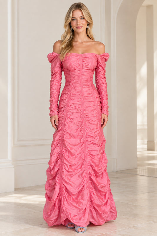 Front view of woman wearing pink off-the-shoulder ruched long sleeve evening maxi gown