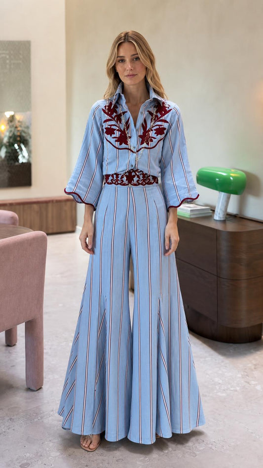 Front view of light blue striped embroidered wide leg jumpsuit
