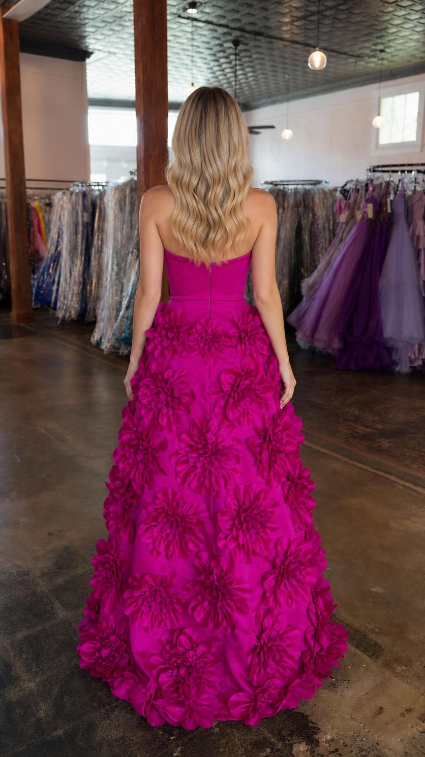 Back view of Fuchsia ballgown with flowing floral skirt